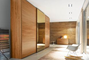 Sliding wardrobe in an interior: esthetic saving of space (54 photos)