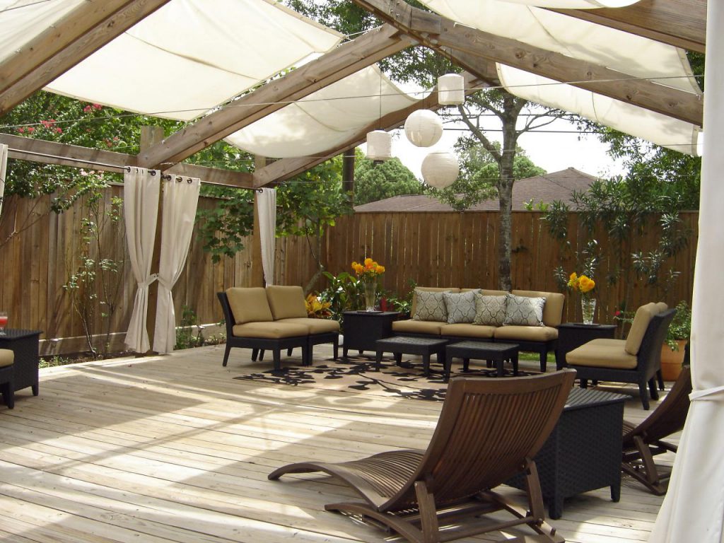 Cozy gazebo covered with fabric