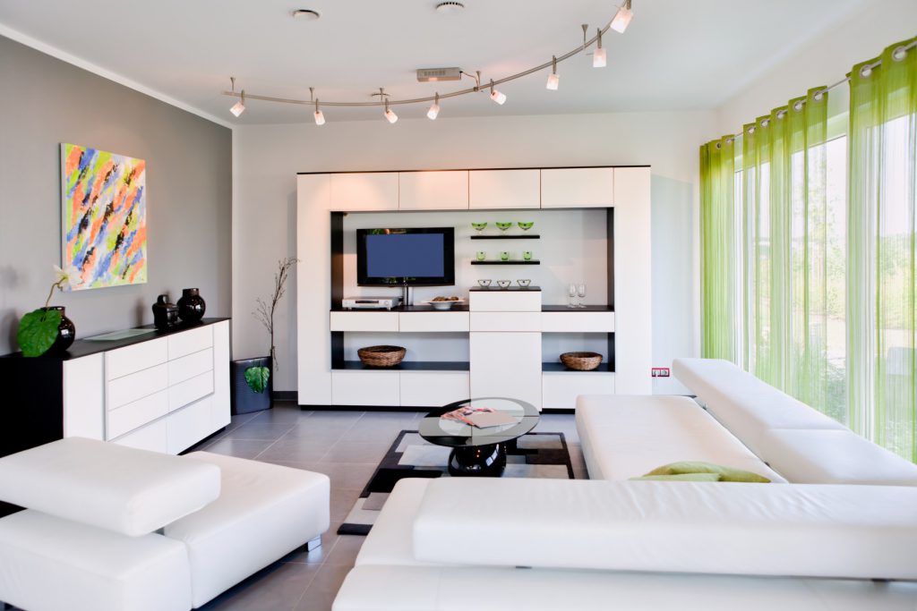 Lime transparent curtains on the grommets in the living room