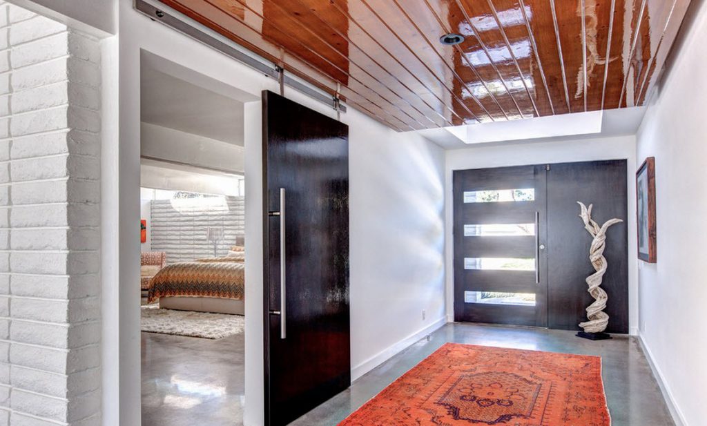 Black doors in a bright home interior