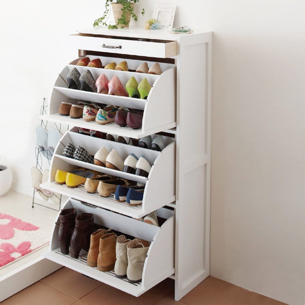 White cabinet with swivel shelves for shoes