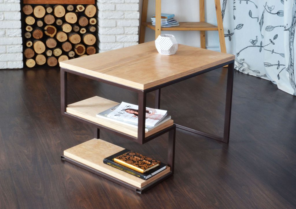 Coffee table made of metal and pressed panels