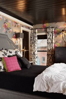 Black ceiling in a comfortable bedroom