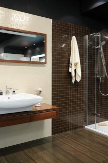 Black ceiling with spotlights in the bathroom