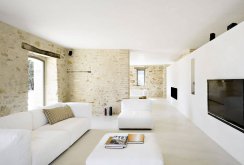 Brick walls in the interior of the house in the style of minimalism