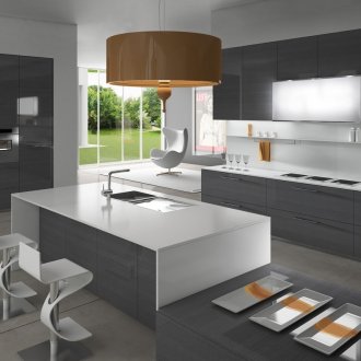 Gray and white minimalistic kitchen with orange accents.