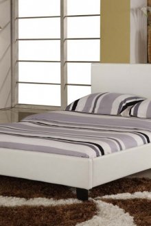 White leather bed in a modern bedroom