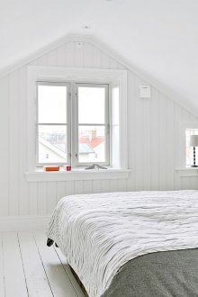 Scandinavian-style attic bedroom