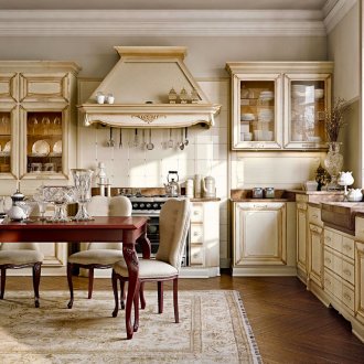 빨간색 식탁이 있는 베이지색 클래식 주방.