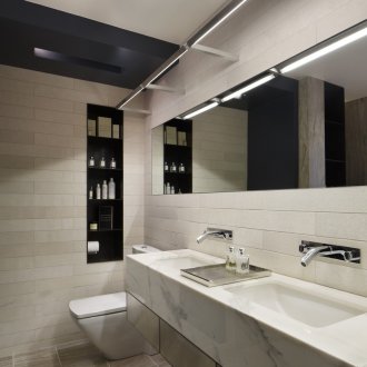 Cream-black bathtub in modern style