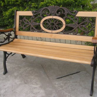 Stylish wood and metal bench with wrought iron elements
