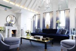 Blue and white living room with fireplace