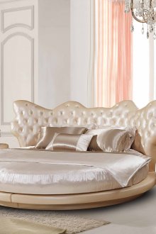 Beige round bed dalam gaya klasik