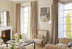 Cozy living room in beige and white.