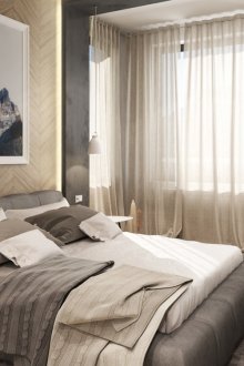 Dinding dan lantai beige di dalam bilik tidur.