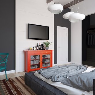 Orange, hijau dan aksen lain dalam bilik tidur hitam dan putih