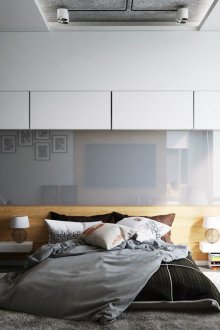 Bilik tidur hitam dan putih dengan panel berkilat kelabu