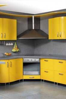 Стилна радиус сиво-жълта кухня