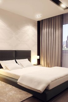 Schwarzes Bett des Minimalismus im Schlafzimmer