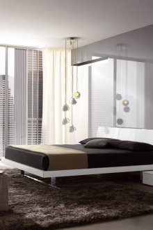 Möbel aus glänzender Spanplatte im Schlafzimmer im Stil des Minimalismus
