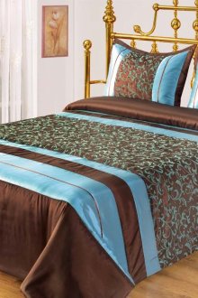 Кафяво-синьо покривало в спалнята