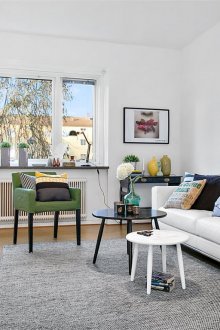 Сиво плетено покривало в светла всекидневна