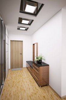 Square recessed downlights in the hallway