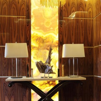 Chandelier and table lamps in the hallway