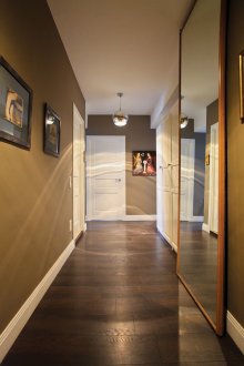 Metal round chandelier in the hallway