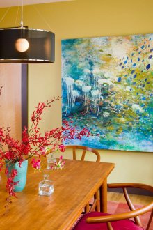 Painting on the wall in the kitchen