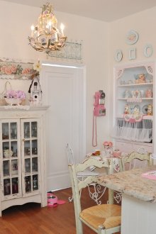 A small chandelier in a floral style in the kitchen