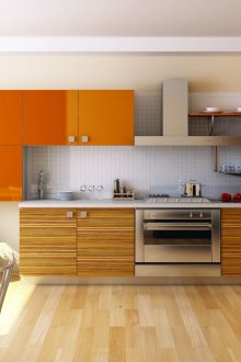 Оранжеви лъскави фасади в кухнята