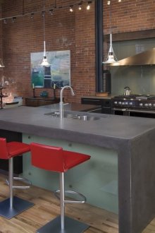 Stylish kitchen with an island in a studio apartment