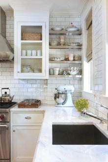 Roman curtains in a bright loft style kitchen
