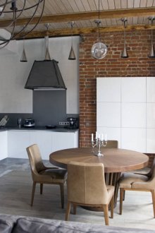 Cream blackout curtains in the kitchen in the loft style