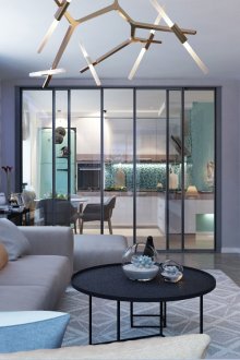 Сини акценти в сива всекидневна