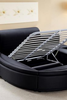 Katil hitam bulat dengan simpanan