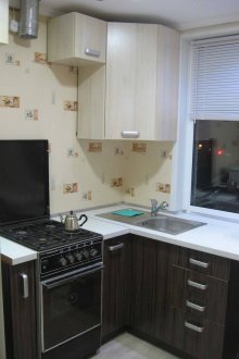 Black and white corner set in a small kitchen