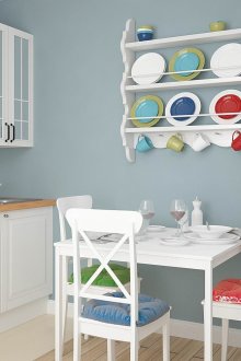 White and brown furniture in a small kitchen