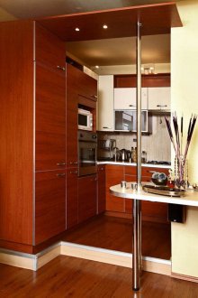 Small beige and brown kitchen