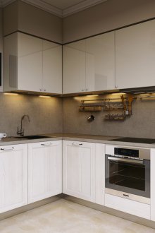 Corner gray and white glossy kitchen