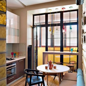 Small kitchen with a large window and access to the balcony