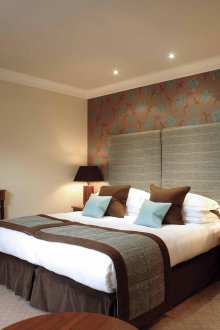 Brown, beige and white colors in the bedroom.