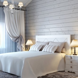 White bedroom with wooden walls