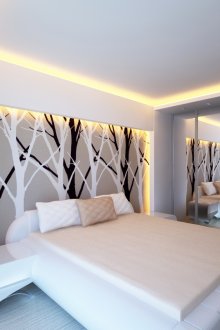 Design white bedroom with photo wallpaper