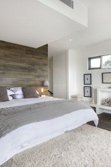 White, beige, gray and brown colors in the interior of a modern bedroom