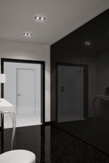 Черна лъскава стена в черно-бяло коридор