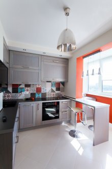 Kitchen 18 sq m, combined with a balcony