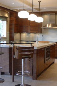 Wooden kitchen with island in a private house