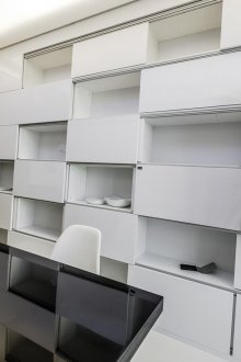 Black and white glossy kitchen.